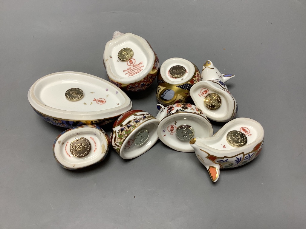 A Royal Crown Derby Collectors Guild Orchard Hedgehog and seven other Royal Crown Derby paperweights